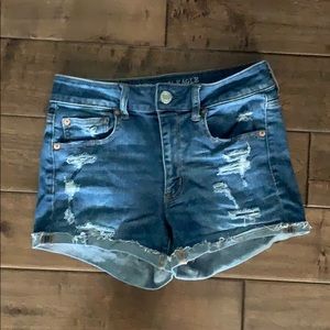 AMERICAN EAGLE HI-RISE SHORTIE JEAN SHORTS